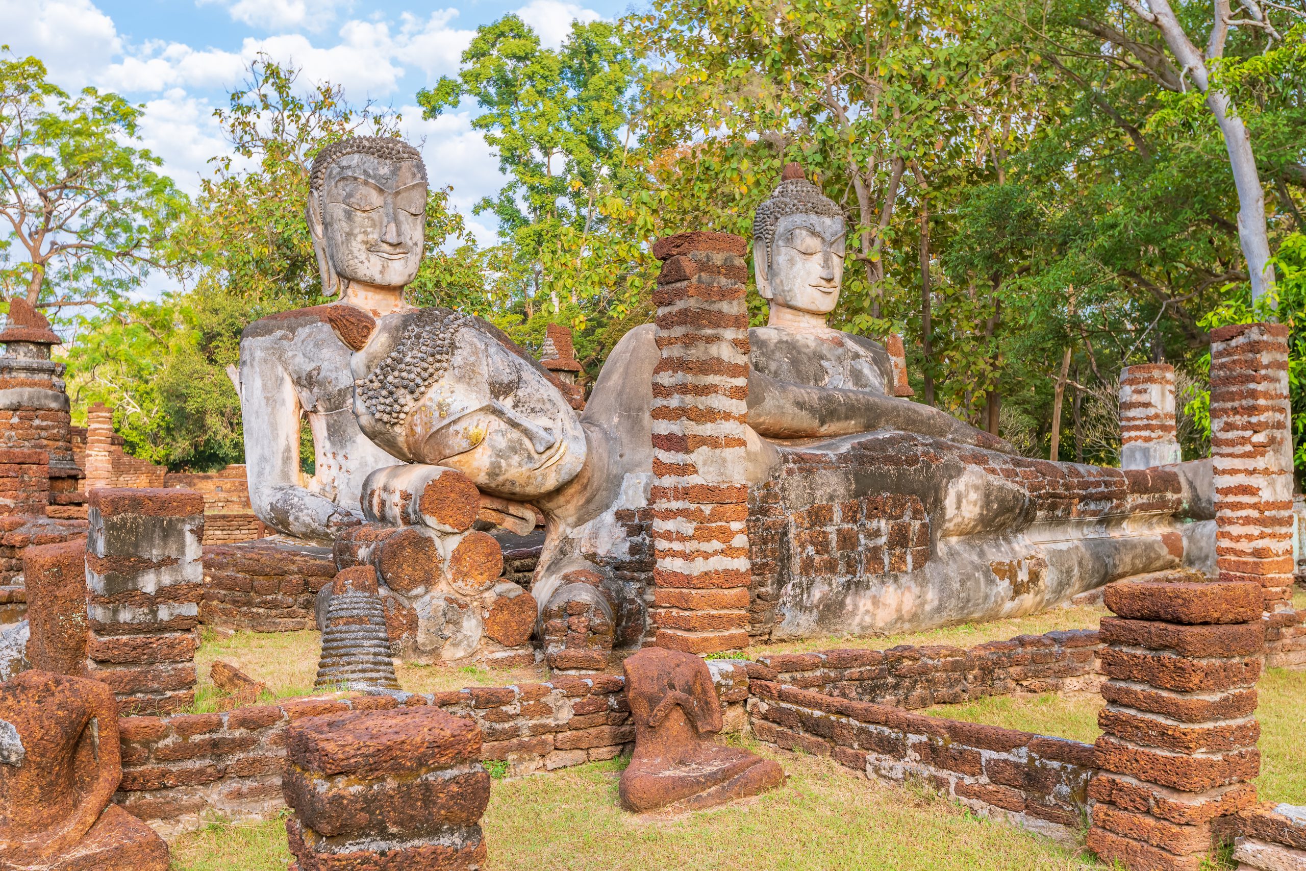 Group of Buddha statues at Wat Phra Kaeo temple in Kamphaeng Phet Historical Park, UNESCO World Heritage site